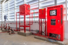 Industrial fire pump station for water sprinkler piping and fire alarm control system. Pipelines, water pump, valves, manometers.